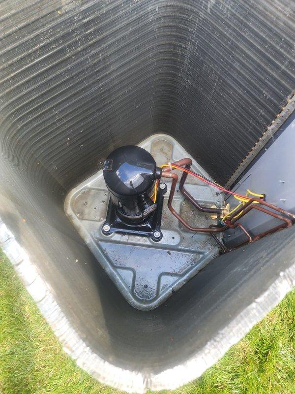 Performed scheduled maintenance on central air conditioning condenser unit. Cleaned accumulated dirt, grime, and debris from exterior fins and coil surfaces to restore proper airflow and heat transfer efficiency. Inspected compressor, electrical connections, and fan assembly; verified system operational with normal heating and cooling function upon completion.