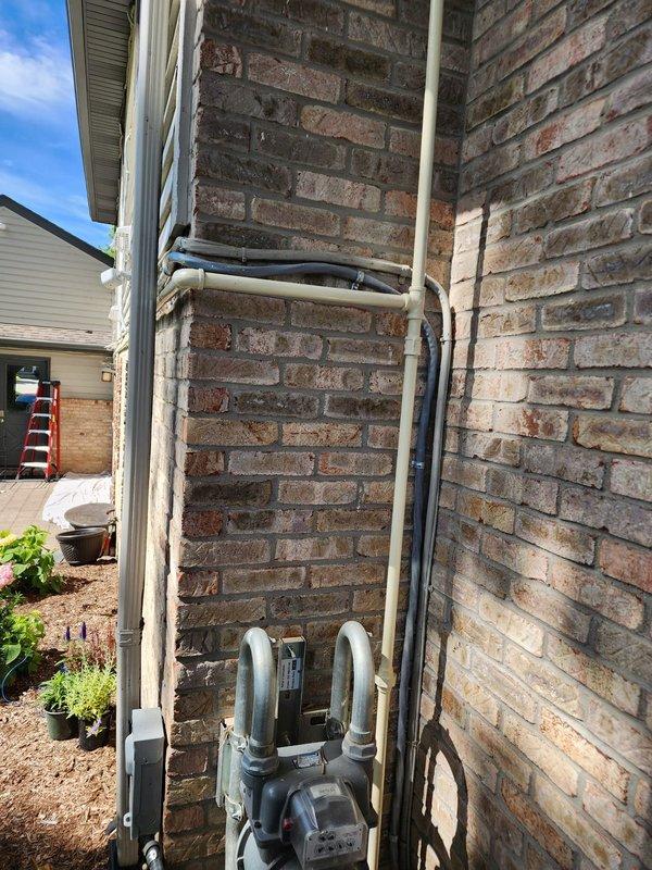 Completed call back for HVAC installation to address gas pipe painting. Retrieved tan-colored paint from shop and applied finish coat to exposed gas piping to match existing exterior brick and trim work. Installed 60,000 BTU unit heater in garage with proper venting and gas line connections. Verified all connections for leaks, tested unit operation, and confirmed proper ignition sequence and heat output. System is operational and ready for use.