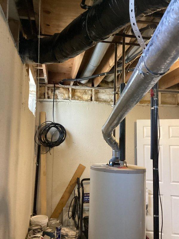 Provided comprehensive estimate for complete replacement of two 29-year-old HVAC systems currently operating at diminished capacity. Evaluated existing equipment configuration including furnace, ductwork, and air handler components located in basement mechanical space, documented current installation conditions, and prepared detailed proposal for dual full system replacement with modern high-efficiency equipment.
