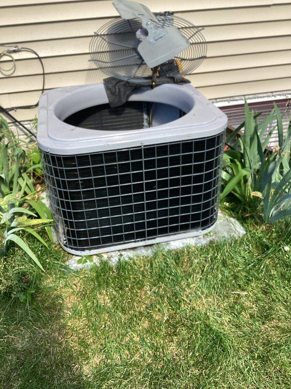 Responded to service call for air conditioning unit that experienced intermittent cooling issue. Performed comprehensive system inspection of outdoor condenser unit, including visual examination of compressor, electrical connections, and all accessible components. Verified proper operation of condenser fan motor and compressor unit. Inspected wiring connections, noting all electrical components secure with no signs of damage or deterioration. Checked condenser coil condition and confirmed adequate airflow around unit. System tested and found operating within normal parameters at time of service with no faults detected.