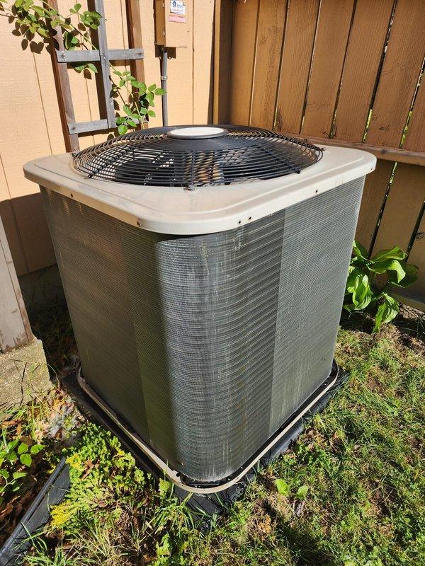 Completed comprehensive preventive maintenance on a 10-year-old residential air conditioning system. Performed full tune-up of outdoor condensing unit including inspection of compressor operation, refrigerant line connections, and electrical components. Verified proper fan motor operation, cleaned condenser coil fins, and checked unit mounting and vibration dampening pads. Inspected indoor air handler components including blower motor assembly, condensate drain pan, and drainage system. Examined refrigerant line insulation and electrical wiring connections for signs of wear or deterioration. All components found operating within normal parameters with no immediate service needs identified. System tested and confirmed cooling cycle functioning properly.