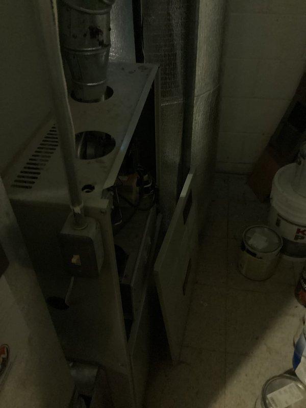Conducted comprehensive assessment of residential HVAC system in basement utility area to provide full system replacement estimate. Evaluated non-operational air conditioning unit and currently functional furnace system, documenting existing equipment configuration, ductwork layout, electrical connections, and installation requirements. Photographed equipment location and surrounding mechanical space to determine specifications for new AC and furnace installation.