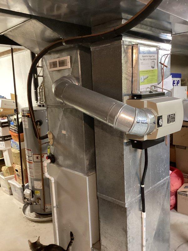 Provided comprehensive estimate for complete HVAC system replacement in basement installation, including non-operational air conditioning unit originally installed in 1997. Assessed existing vertical furnace configuration with galvanized ductwork, evaluated equipment accessibility and replacement requirements, and documented current system layout including ductwork connections and clearance specifications. Coordinated follow-up diagnostic service visit to determine repair viability versus full system replacement options.
