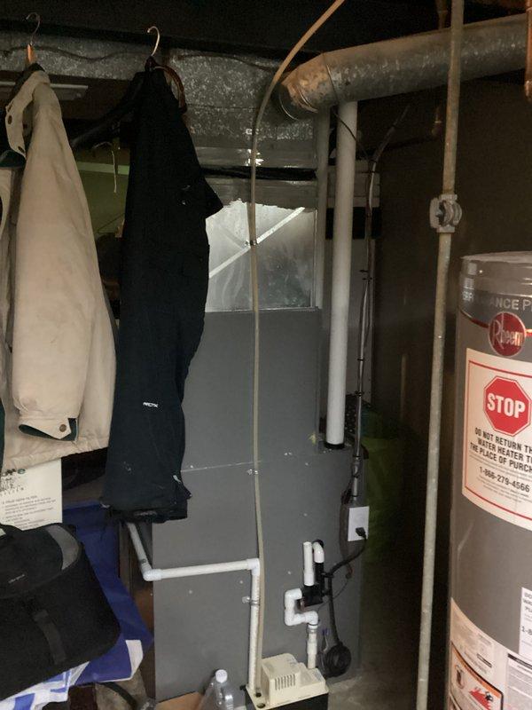 Conducted comprehensive assessment of residential HVAC system and identified failed evaporator coil requiring replacement. Documented existing equipment configuration including furnace, ductwork, and associated mechanical components in basement utility area, and provided detailed estimate for evaporator coil replacement to restore cooling system functionality.