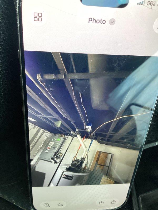 Documented existing HVAC system and water heater installation in basement utility room. Photographed current equipment layout, ductwork configuration, and mechanical room conditions to support replacement estimate preparation.