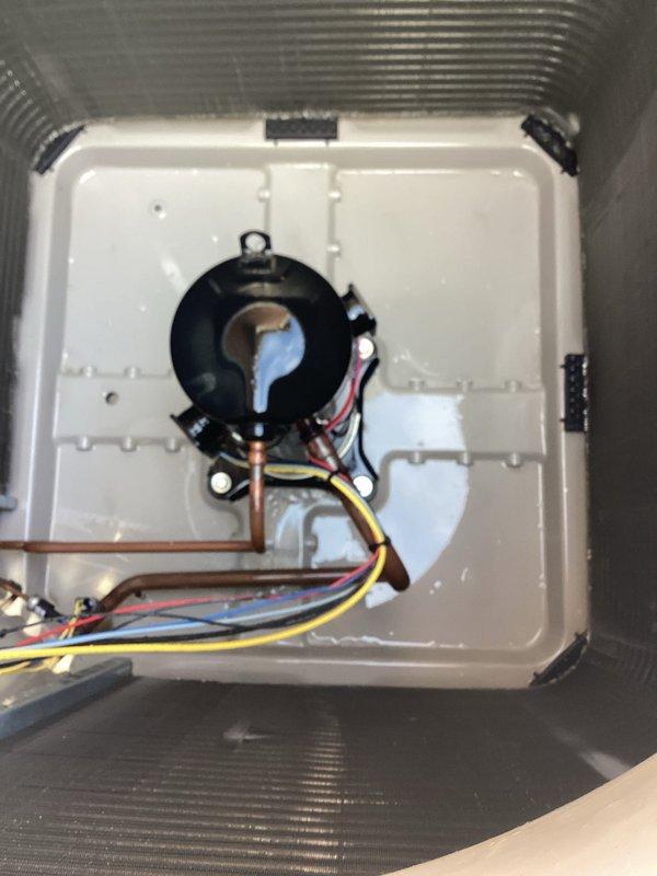 Completed comprehensive cooling season maintenance inspection on residential air conditioning system. Performed thorough examination of evaporator coil assembly, confirming proper fin condition and cleanliness with no visible debris accumulation or damage. Inspected blower motor assembly, refrigerant line connections, and electrical wiring connections, verifying all components secure and operating within normal parameters. All system components found in good working condition with no immediate service needs identified.