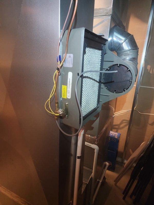 Replaced defective plastic humidifier supply line (8-12 size) on residential HVAC air handler unit. Removed old tubing, installed new line with proper routing and connections, and verified system operation upon completion.