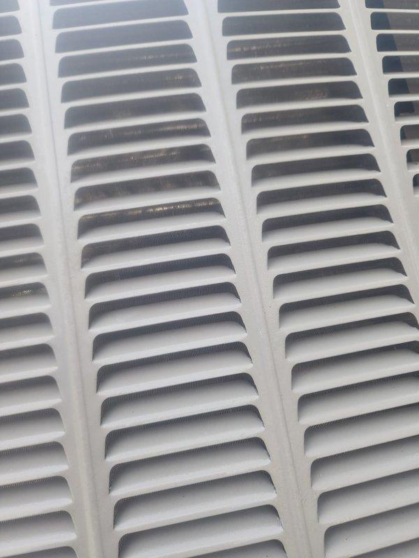 Responded to service call for AC unit making loud noises and experiencing high amp draw. Upon inspection, found compressor showing signs of moisture accumulation and visible condensation on components, indicating potential operational stress. Performed system evaluation of evaporator coil, refrigerant lines, and electrical connections; all appeared intact with proper wire terminations. Cleaned air handler grilles which showed dust accumulation that could restrict airflow and contribute to increased amp draw. Recommended full maintenance service to address underlying issues causing excessive noise and high amperage readings, as immediate repair could not be completed during this visit.