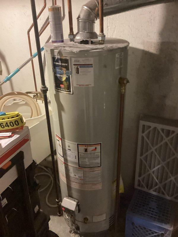 Completed HVAC estimate for replacement of 11-year-old American Standard air conditioning system that was failing to maintain desired temperature setpoint, with indoor temperature remaining at 75°F despite thermostat set to 70°F. Evaluated existing equipment including outdoor condensing unit located between porch and neighboring property, as well as indoor air handler and associated ductwork in basement utility area. Previous technician had recommended full system replacement due to repair costs exceeding value of aging equipment. Documented current system configuration, photographed air handler installation with supply plenum connections and drain line routing, and assessed compatibility requirements for replacement equipment installation.