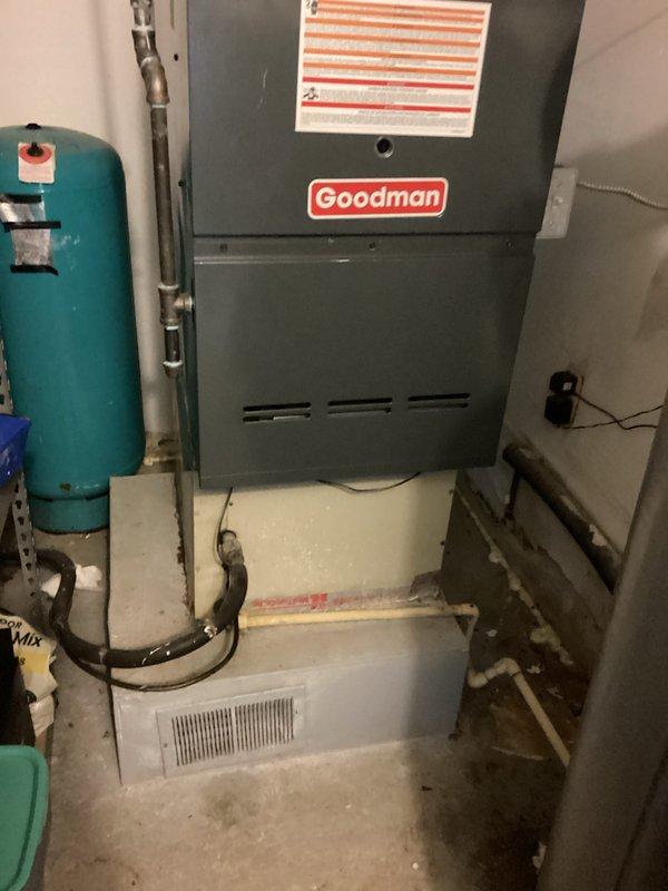 Completed estimate for air conditioning system replacement on a 1988 unit showing inadequate temperature differential despite producing cold air. Assessed existing Goodman furnace installed in February 2024, documented basement mechanical room configuration including ductwork connections, and provided replacement options for the aging AC system.