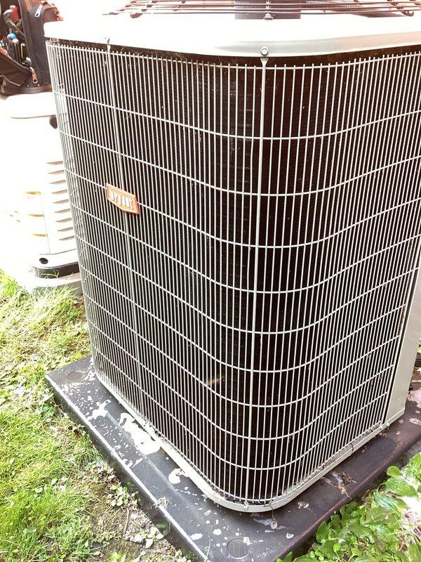 Completed comprehensive AC tune-up and maintenance service on a 3-year-old residential cooling system per customer's Consumers Energy coupon request. Performed thorough inspection of outdoor condenser unit including heat exchanger coils, refrigerant lines, compressor compartment, and electrical connections; all components found to be in proper working condition with no deficiencies noted. System operational and ready for cooling season.