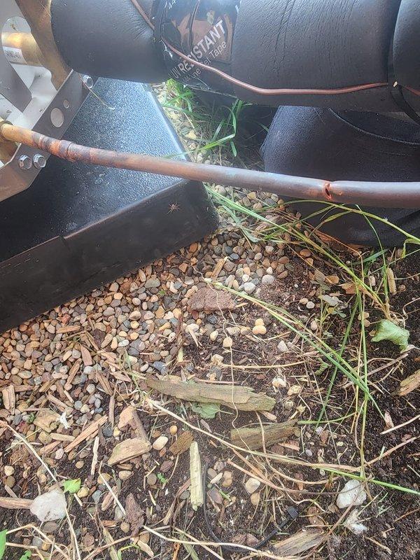 Responded to service call for complete refrigerant loss due to damaged refrigerant line set. Upon arrival, confirmed copper line set had been severed during lawn maintenance activities, resulting in total system evacuation. Repaired damaged refrigerant line, pressure tested system for leaks, evacuated to proper micron level using manifold gauges, and recharged system to manufacturer specifications. Verified proper system operation and temperature differential across coil before completing service.