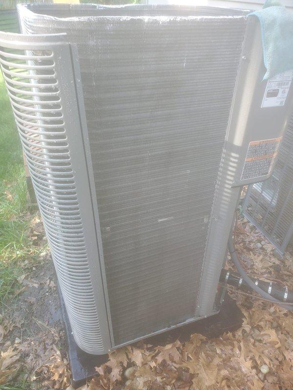 Completed spring maintenance tune-up on 2-year-old air conditioning system located on east side of building. Performed comprehensive inspection of outdoor condenser unit and indoor evaporator coil assembly, verified refrigerant levels, checked electrical connections, cleaned condensate drain system, and confirmed proper operation of all components. Unit is operating within manufacturer specifications with no issues identified.