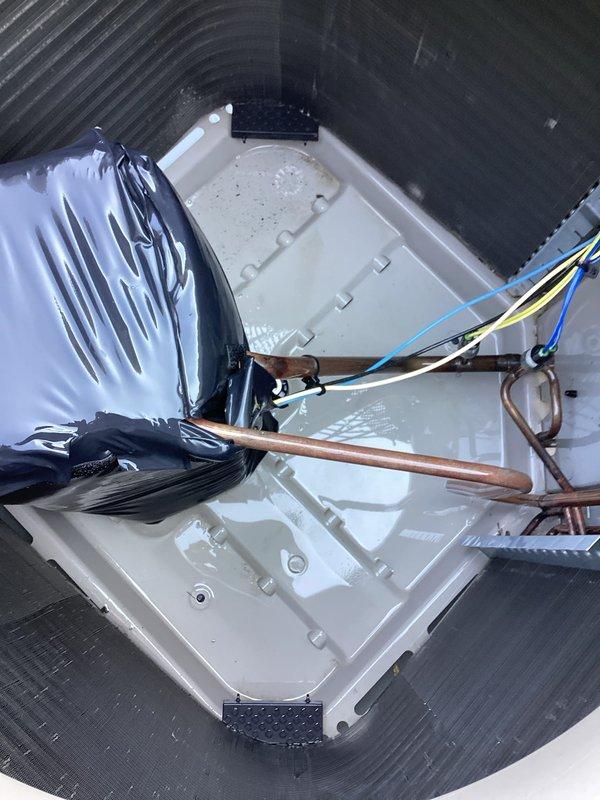 Completed comprehensive preventive maintenance on residential AC system and mini-split unit. Serviced condensate drain pan, inspected and cleaned condenser coils, verified refrigerant lines and electrical connections, and confirmed proper operation of outdoor condensing unit with fan assembly functioning within normal parameters.