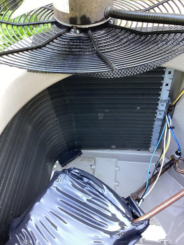 Completed comprehensive preventive maintenance on residential AC system and mini-split unit. Serviced condensate drain pan, inspected and cleaned condenser coils, verified refrigerant lines and electrical connections, and confirmed proper operation of outdoor condensing unit with fan assembly functioning within normal parameters.