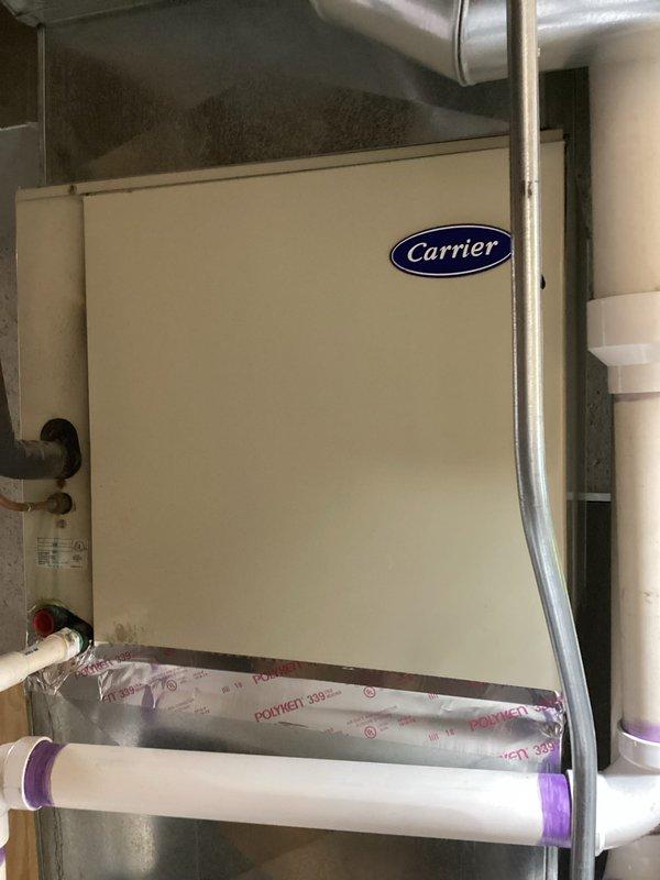 Provided comprehensive estimate for replacement of 20-year-old residential air conditioning system currently operational but nearing end of service life. Evaluated existing Carrier furnace and outdoor condenser unit positioned on exterior concrete pad, assessed ductwork configuration and drainage components. Documented equipment specifications, measured installation space requirements, and reviewed system compatibility for complete HVAC replacement recommendation.