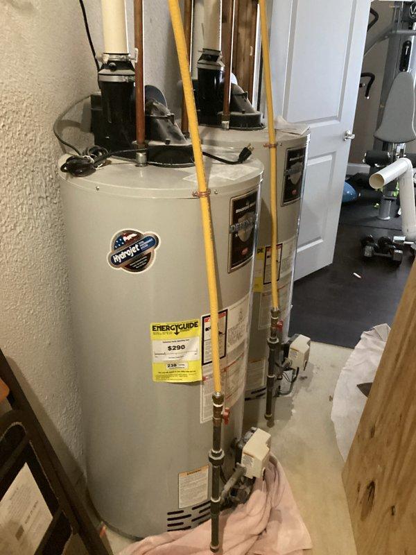 Completed comprehensive water heater replacement estimate for residential property requiring evaluation of multiple water heating solutions. Assessed existing traditional tank-style water heater installation in utility room, noting current Invent brand unit with standard copper supply lines, gas connections via flexible yellow CSST lines, and proper venting configuration. Evaluated mechanical room layout, existing plumbing infrastructure including overhead drain and vent lines, and available space constraints for potential equipment upgrades.

Provided detailed estimates for two conventional tank-style water heater replacements and one tankless water heater conversion option. Assessment included examination of existing gas line capacity, electrical requirements, venting pathways through floor joists, and compatibility with current plumbing configuration. Documented all mechanical connections, clearance requirements, and structural considerations necessary for each installation scenario