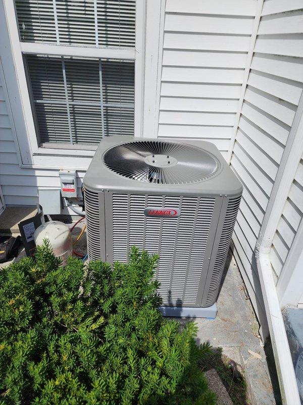 Completed full HVAC system installation including new Lennox furnace and air conditioning condenser unit. Installed Honeywell Home ProSeries digital thermostat with programmable temperature control and auto fan settings. Removed existing humidifier from system per customer request. Positioned outdoor condenser unit on concrete pad in side yard alcove with proper clearances maintained. Verified all electrical connections, refrigerant lines, and condensate drainage. System tested and operating within manufacturer specifications with cooling mode engaged and thermostat communicating properly with equipment.