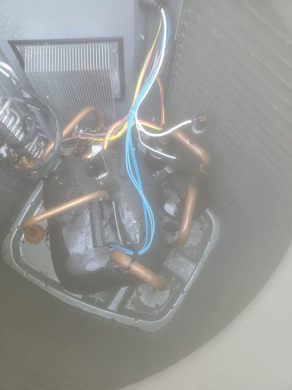 Completed comprehensive cooling system maintenance and renewed service plan at time of visit. Performed standard AC maintenance protocol on outdoor condenser unit, including inspection of exterior housing, filter grille panel, and refrigerant line connections. Inspected indoor HVAC components including refrigerant tubing with visible oxidation pattering, electrical connections, and air distribution vent system. All copper refrigerant lines, electrical wiring bundles, and control connections found to be secure and operational. Unit operating within normal parameters upon completion of maintenance service.