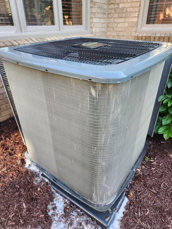 Completed routine cooling season maintenance on residential air conditioning system. Performed comprehensive inspection of outdoor condensing unit, verified proper operation of compressor and fan motor, checked refrigerant levels and pressures, cleaned condenser coils, and inspected drain pan and condensate drainage system. All components found operating within normal parameters. Customer renewed Worry Free Service Agreement with technician during visit.
