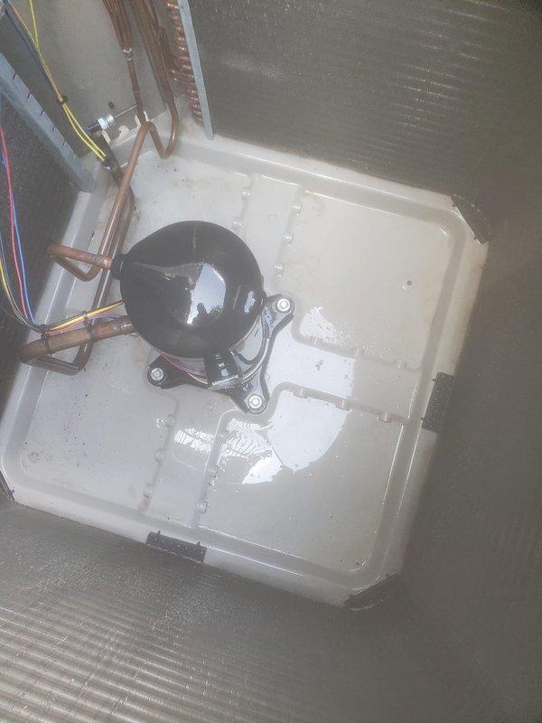 Completed scheduled preventive maintenance on Bryant residential air conditioning system. Performed comprehensive inspection of outdoor condenser unit, verifying proper operation and condition of cabinet, louvers, and external components. Inspected indoor evaporator coil assembly and drain pan system in attic space, confirming compressor operation and refrigerant line connections. Observed condensate drainage and verified drain pan functionality. System tested and operating within normal parameters upon completion of maintenance service.