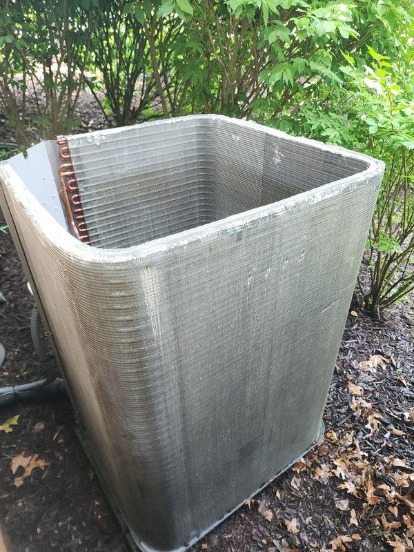 Completed preventative maintenance inspection on residential split system air conditioning unit per Worry Free Service Agreement. Inspected indoor evaporator coil assembly and condensate drain pan, noting rust staining and discoloration on pan surface; verified condensate pump operation and electrical connections. Performed exterior inspection of condenser unit, checking refrigerant line connections and overall unit condition with normal weathering observed.