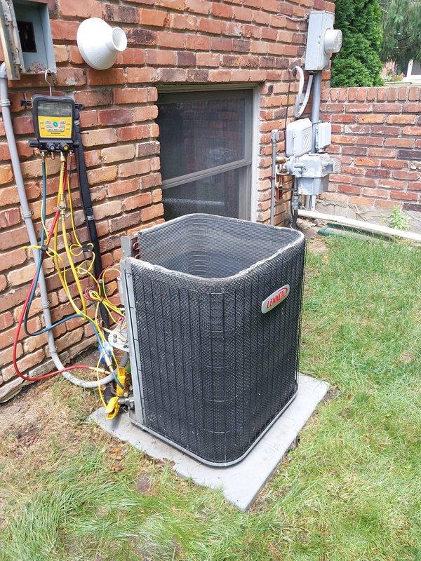 Responded to no cooling complaint on 11-year-old residential air conditioning system. Connected manifold gauges to outdoor condensing unit and performed diagnostic evaluation of refrigerant pressures and system operation. System evaluated and customer advised of findings.