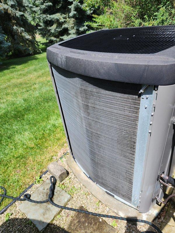 Completed preventive maintenance service on dual outdoor AC condenser units as part of Worry Free Service Agreement cooling season inspection. Both units were thoroughly inspected, including visual assessment of housing integrity, electrical connections, refrigerant lines, and overall operational condition. All equipment found to be in good working order with no visible damage, rust, or deterioration noted on either system.