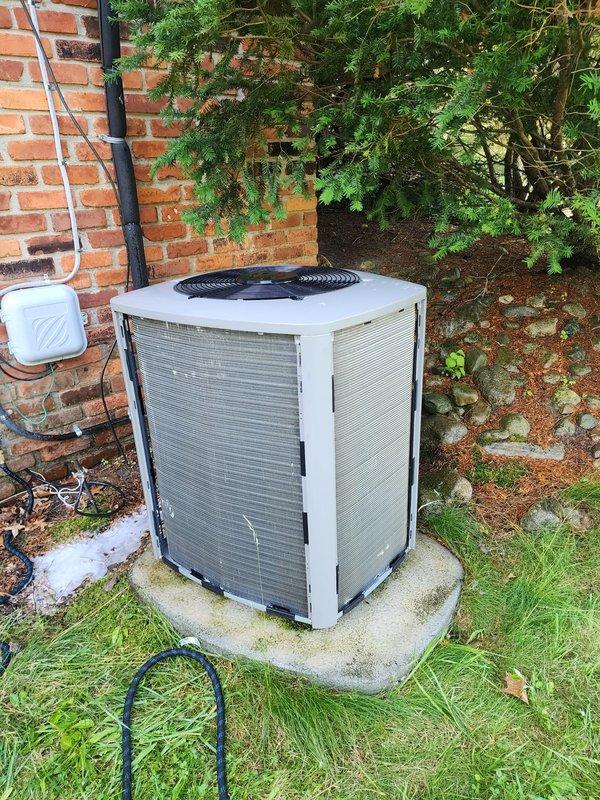 Performed comprehensive AC tune-up on dual-zone residential cooling system including outdoor condenser unit and basement air handler with condensate pump. Inspected refrigerant lines, electrical connections, and drain pan assembly; verified proper operation of all components; cleaned condenser coils and checked airflow; system operating within normal parameters with no issues identified.