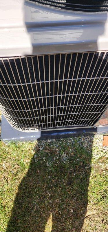 Completed annual air conditioner tune-up on one-year-old outdoor condensing unit. Performed comprehensive system inspection including condenser coil examination, refrigerant level verification, electrical connection testing, and condensate drain pan assessment. Unit operating within normal parameters with no deficiencies noted; all components functioning properly and system ready for cooling season.