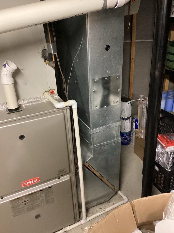 Responded to service call for residential air conditioning system that ceased operation over the weekend. Upon inspection, determined existing unit was over 20 years old with failed capacitor or seized fan motor. Conducted comprehensive assessment of current HVAC system including Bryant furnace and associated ductwork in basement utility area. Provided detailed replacement estimate for new air conditioning system to restore cooling capacity to the residence.