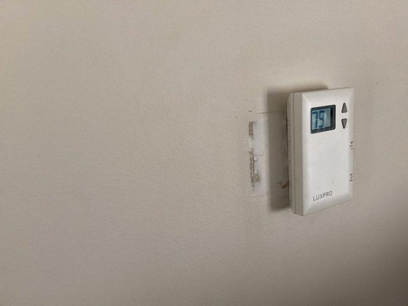 Completed installation of Lennox air conditioning system in mobile home, including new outdoor condensing unit, indoor air handler with evaporator coil, refrigerant line set, condensate drain line, electrical connections, and LUXPRO digital thermostat. System was tested, charged to manufacturer specifications, and verified operational with all components functioning properly.