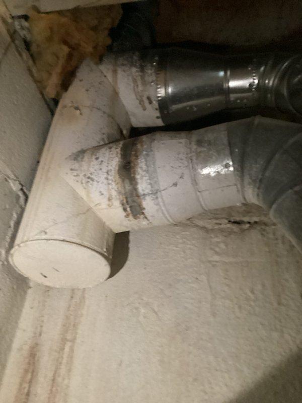 Provided estimate for complete HVAC system replacement of 1992 equipment located in basement mechanical room. Current air conditioning unit operational but not cooling effectively due to age and system deterioration. Assessed existing natural gas furnace with drum-style humidifier, air handler, and aging ductwork showing significant wear, discoloration, and staining throughout attic installation, indicating compromised system efficiency and need for full system upgrade.