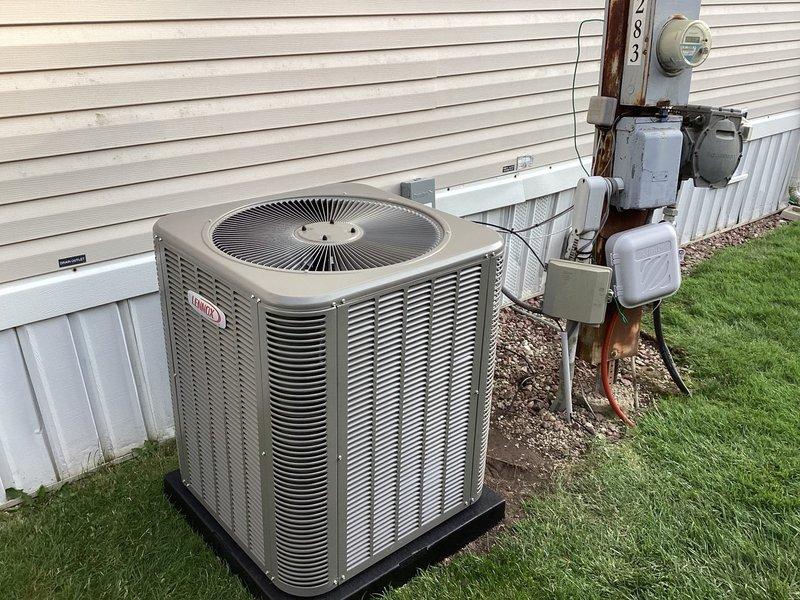 Completed installation of Lennox air conditioning system for mobile home application. Installed outdoor condenser unit on gravel pad with proper clearances, mounted electrical disconnect box on exterior wall, and connected indoor air handler in utility closet space. System tested and confirmed operational upon completion.