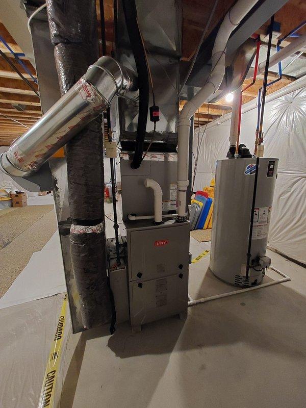 Responded to no-airflow complaint on 3-year-old residential AC system. Upon arrival, confirmed outdoor condensing unit was operating but no air distribution throughout home. Inspected Bryant furnace/air handler in basement and diagnosed failed blower motor. Blower motor was not energizing despite proper voltage supply to unit. Removed blower assembly from air handler cabinet, confirmed motor failure through continuity testing and visual inspection. Replaced defective blower motor with OEM equivalent replacement, reconnected all electrical connections, and reinstalled blower assembly into furnace housing. Verified proper motor operation, confirmed adequate airflow through supply registers, and tested system through complete cooling cycle. System restored to normal operation with proper airflow distribution throughout residence.