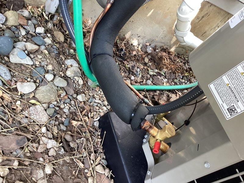 Successfully installed a new Bryant air conditioning system, including the indoor air handler unit (Model CVAVA3621XMAABAA) and outdoor condensing unit. The indoor section was configured as part of a heat pump or air conditioner system utilizing R-454B refrigerant with a TXV metering device. Completed all refrigerant line connections using properly insulated copper piping, installed brass service valves with isolation capabilities, established condensate drainage via PVC piping, and verified all pressure ratings meet manufacturer specifications. System was installed on a concrete pad with secure mounting and all electrical connections completed per code requirements.