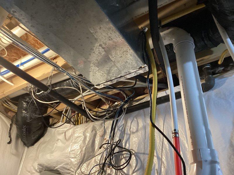 Completed installation of a 50-gallon tanked water heater in basement utility area. Configured all necessary connections including gas supply line, cold water inlet, hot water outlet, and proper venting through existing infrastructure. Installed pressure relief valve with discharge piping, confirmed all connections meet code requirements, and verified proper operation of the unit upon completion.