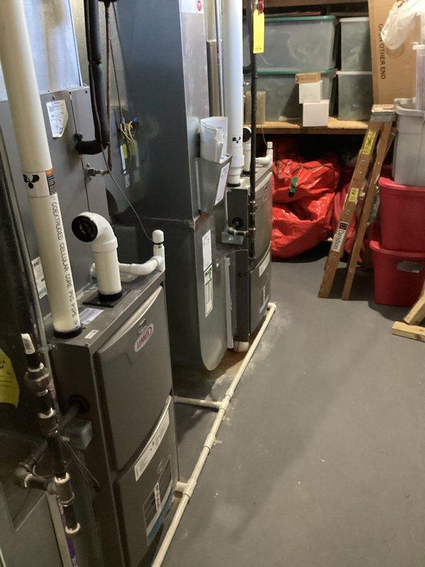 Provided comprehensive estimate for complete HVAC system replacement including furnace and air conditioning equipment. Existing 15-year-old Lennox natural gas furnace and associated system components currently operational but nearing end of service life. Assessed mechanical room installation with existing PVC venting configuration, ductwork connections, and clearance requirements for new equipment specifications.