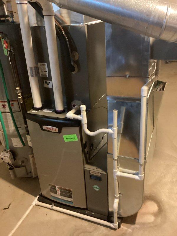 Completed HVAC system evaluation for a 12-year-old residential unit that experienced blower motor failure due to a power outage. Documented existing furnace installation, electrical panel configuration, and overall system condition with photographs to provide comprehensive replacement estimate for aging equipment that has reached the end of its expected service life.