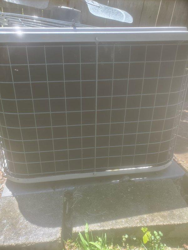 Completed routine air conditioning maintenance on residential outdoor condenser unit. Performed standard 10-point inspection including visual examination of compressor motor, condenser coil, refrigerant lines, and drain system. Unit operating within normal parameters with no immediate service needs identified.