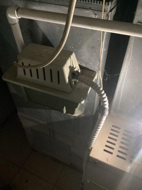 Conducted comprehensive replacement estimate for 35-year-old residential air conditioning system serving master bedroom and bathroom zone. Unit currently operational but exhibiting declining cooling performance, particularly during peak demand periods, with minimal maintenance history over its service life. Inspected interior mechanical components, refrigerant lines, and evaporator coil assembly. Evaluated aged ductwork system showing significant weathering and corrosion on transition components. Assessed copper refrigerant tubing routing and connections throughout mechanical space. Property has two separate AC systems (35 and 32 years old respectively), with homeowner seeking professional replacement recommendations and competitive options for the underperforming unit. Recent temporary repairs performed by another contractor prior to estimate request. Provided technical assessment and replacement options for aging equipment that has exceeded typical service life expectancy.