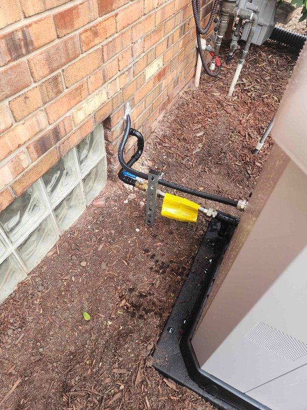 Successfully installed a Briggs & Stratton 13kW standby generator with a 150-amp automatic transfer switch at residential property. Ran electrical conduit along exterior brick wall from main electrical panel to generator location, installed transfer switch to enable automatic power switching during outages, and completed all necessary wiring connections. Set generator unit on prepared pad adjacent to building, connected natural gas supply line with appropriate fittings and shutoff valve, and performed system testing to verify proper operation of both generator and transfer switch. Submitted completion certificate documentation for financing approval and secured all required identification paperwork per program requirements.