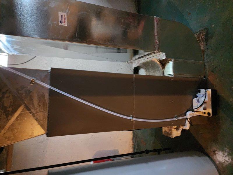 Completed full HVAC system installation including new Lennox furnace and air conditioning system. Installed air handler unit in utility area with proper ductwork connections, evaporator coil, condensate pump with PVC drainage piping, and electrical connections. System tested and operational upon completion.