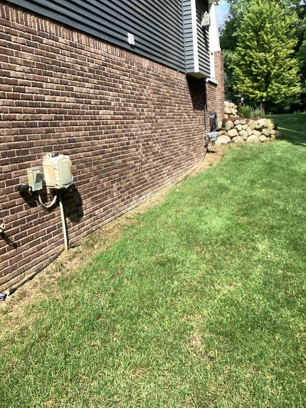 Completed electrical estimate for standby generator installation at residential property. Assessed existing HVAC system location in basement utility area to determine optimal routing for generator electrical connections and transfer switch placement. Evaluated exterior brick wall mounting locations for generator pad positioning, considering proximity to existing utility boxes and adequate clearance from landscaping features. Documented current electrical service configuration and determined requirements for automatic transfer switch installation to integrate with home's heating and cooling systems.