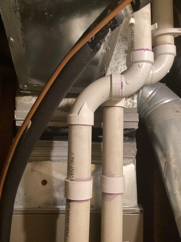 Completed HVAC replacement estimate for residential system. Evaluated existing equipment configuration including air handler unit in attic space, water heater, and humidifier system in mechanical room. Documented current installation with PVC venting, ductwork connections, and equipment layout to provide comprehensive replacement recommendations.