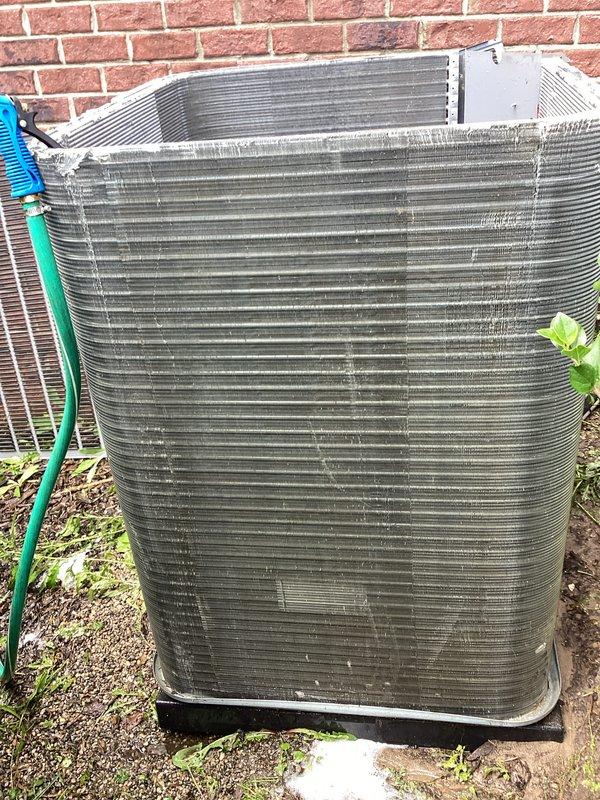 Responded to callback for non-operational air conditioning system. Upon arrival, performed visual inspection of outdoor condensing unit and internal components. Found unit with dirty condenser coil showing significant debris accumulation and weathering on exterior fins. Opened unit to inspect compressor, refrigerant lines, and electrical connections. All copper refrigerant lines showed normal oxidation consistent with age, with no visible leaks detected. Compressor appeared operational with secure mounting and intact electrical connections. Documented current condition of equipment with photographs for service records.