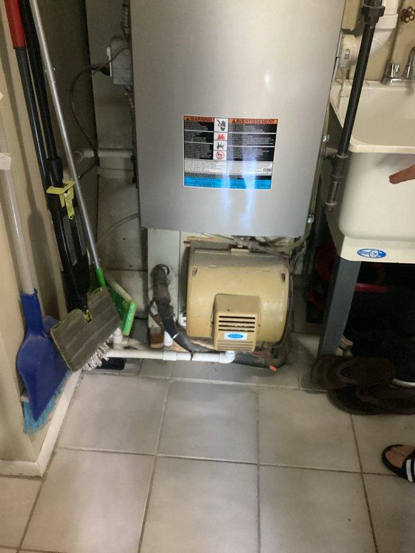 Provided replacement estimate for non-operational air conditioning system with existing 20+ year old Lennox HVAC equipment located in utility room. Assessed current furnace setup with natural gas fuel source, documented existing installation configuration including ductwork connections, PVC condensate piping, and mechanical room layout. Prepared comprehensive equipment replacement recommendations for complete system upgrade.