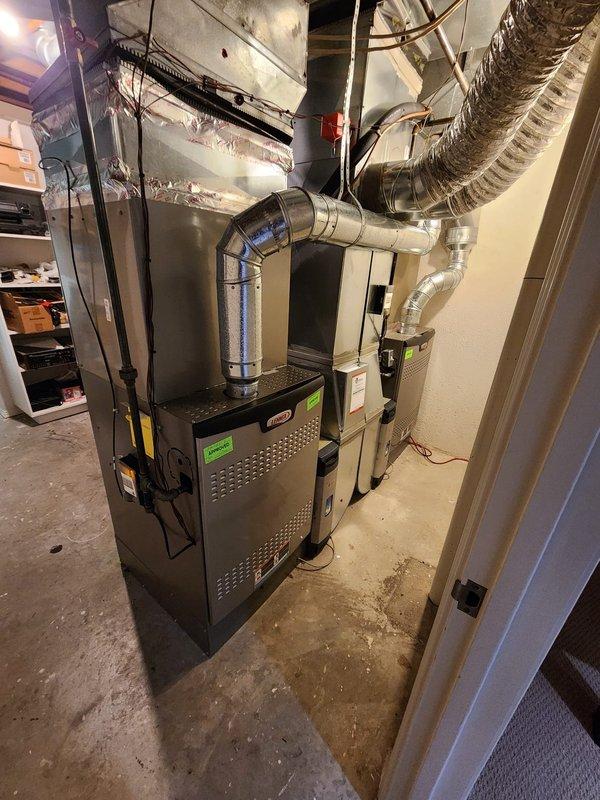 Successfully installed two Bryant air conditioning units at residential property. Connected new AC systems to existing furnace and ductwork infrastructure in basement mechanical room, ensuring proper integration with current HVAC setup. All installations completed to manufacturer specifications with equipment operational and tested upon completion.