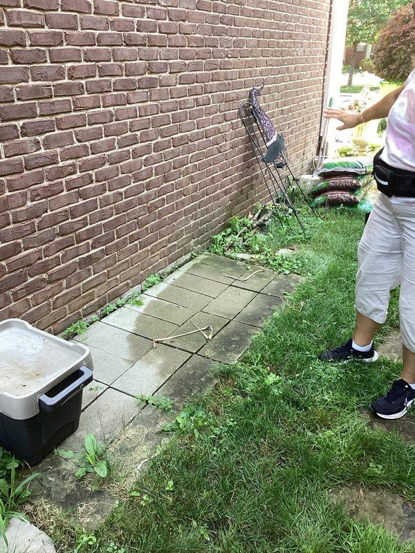 Conducted comprehensive site evaluation for standby generator installation at residential property. Assessed existing electrical infrastructure, including current HVAC equipment and utility connections along exterior brick wall. Documented installation location requirements, clearance specifications from building structures, and optimal positioning for generator pad placement on lawn area adjacent to existing concrete utility bases. Evaluated accessibility for fuel line routing, transfer switch installation requirements, and compliance with manufacturer clearance specifications for proper ventilation and service access.