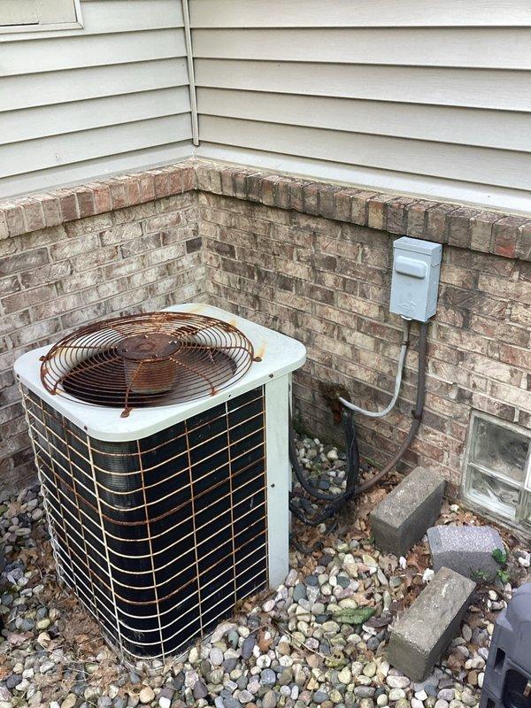 Completed comprehensive replacement estimate for aging 1996/1997 HVAC system with cracked heat exchanger in furnace and R22 refrigerant air conditioning unit. Documented existing outdoor condensing unit and indoor ductwork configuration, noting system's obsolete refrigerant type and critical safety hazard requiring immediate replacement to ensure proper heating and cooling operation.